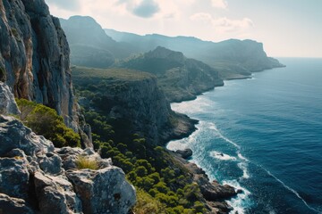A breathtaking view of the ocean from the top of a majestic mountain. Perfect for travel and nature themes - obrazy, fototapety, plakaty
