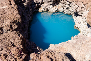 A sacred pond that grows naturally It is blue like the sea. Found some places in Thailand Unseen Tour Thailand