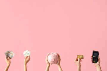 Female hands with piggy bank, payment terminal, credit card and money on pink background - obrazy, fototapety, plakaty