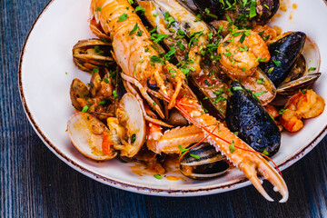 Seafood platter. Langoustine, vongole, shrimps, prawns, clams, mussels, scallop