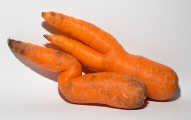 Two crooked carrots are mutants. Association of erotic intimacy.