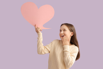 Happy little girl with speech bubble on lilac background. Valentine's day celebration