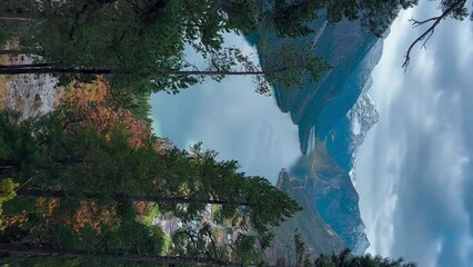  Plansee lake among snow-capped mountains in Tyrolean Alps, Austria late autumn in cloudy weather. Vertical video. High quality 4k footage - Powered by Adobe