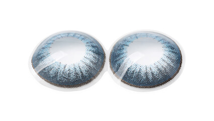Two blue contact lenses isolated on white