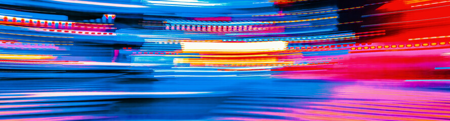 City motion blurred street intersection background at night