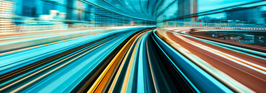 Abstract high speed technology POV motion blurred concept image from the Yuikamome monorail in Tokyo, Japan