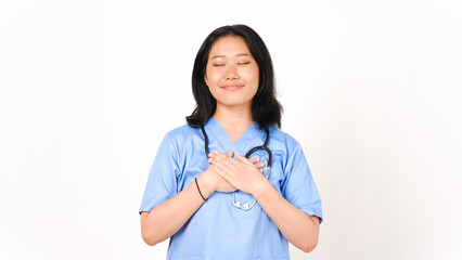 Young Asian female doctor hand on chest grateful gesture isolated on white background