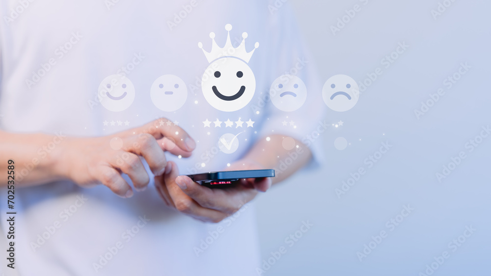 Aufkleber Customer use a smartphone give point the smile face icon for feedback review satisfaction service opinion and testimonial on application. Online customer review satisfaction feedback survey.
