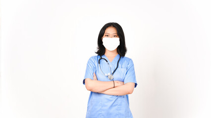 Young Asian female doctor using medical mask holding arms and looking at camera isolated on white...