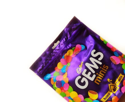 Guwahati, Assam, India - December 27, 2023 : Cadbury Gems Chocolate Home Treats Pack. These Colorful Coated Milk Chocolate Buttons Are Loved By Everyone, The Perfect Chocolate For Kids And Adults. 