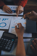 Finance manager meeting discussing company growth project success financial statistics, professional investor working start up project for strategy plan with document, laptop and digital tablet.