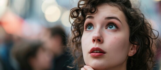 Baffled female answering at public event.