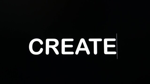 Using boldface and upper case letters to type the word create using a desktop computer.