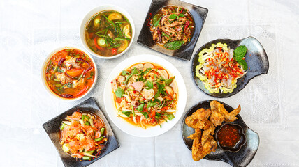 Traditional northeastern Thailand floods, Many variety various Isaan foods on a table.