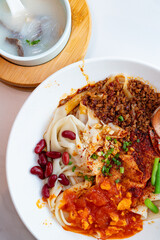 top view xi an biangbiang noodles with mutton entrails soup at vertical composition