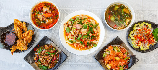 Traditional northeastern Thailand floods, Many variety various Isaan foods on a table.