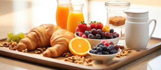 Nutritious hotel breakfast including coffee, juice, pastries, cereals, and fruit.