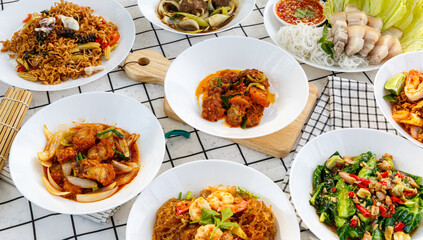 variety of Thai food Including menu Miang, crispy pork, steamed shrimp with vermicelli
