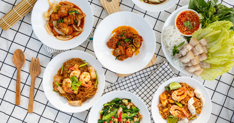 variety of Thai food Including menu Miang, crispy pork, steamed shrimp with vermicelli