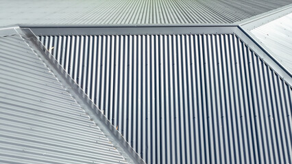 Drone aerial photograph of a grey coated corrugated iron roof on a domestic residence - obrazy, fototapety, plakaty