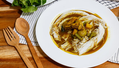 Rice noodles with Fermented Fish Entrails Soup.Fish organs sour soup. Thai cuisine