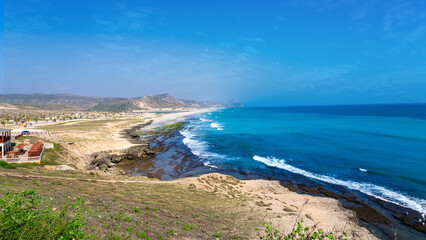 Al Mughsayl Beach (also written as Al Mughsail Beach)