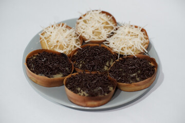 Homemade Sweet Martabak or Traditional Indonesian Sweet Mini Pancakes on a white background