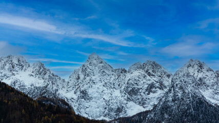 The banner mountain view of alpine as snow-capped mount peaks scene  in Winter mountains background
