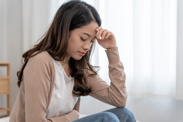 Unhappy asian woman girl disappointed, sad about problem in home alone, feel lonely, Stressed,...