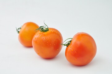 Tomato isolate. Tomato red on white background.