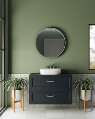 A modern furnished bathroom with a circle round mirror on a green wall and a modern vanity sink.