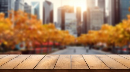 The empty wooden table top with blur background of business district and office building in autumn....