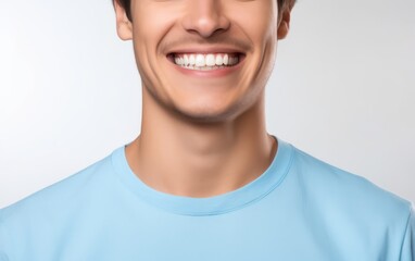 cropped half face portrait of attractive male with healthy white teeth