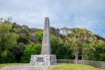 Fototapeta na wymiar Haast new zealand 14th Dec 2023: the stone monument to commemorate the road link between Westland and Otage at Knights Point Lookout.