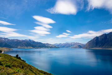 the panorama view of lake Hawea.  It is in the Otago Region New Zealand,  at an altitude of 348 metres. It covers 141 km² and reaches 392 metres deep.