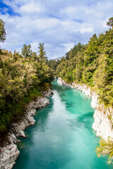 Fototapeta na wymiar the view of Hokitika Gorge, a major tourist destination some 33 km or 40 minutes drive inland from Hokitika, New Zealand With stunning blue waters and spectacular rock formations.