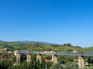 Fototapeta na wymiar Peso da Régua metal bridge (1872). Built by a German engineer from the Eiffel team. Portugal.