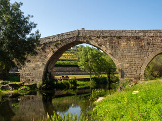 View of the Gothic bridge (15th century), in the town of Ucanha. Portugal.