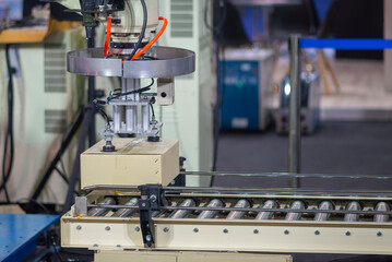 The paper box container part gripping by  vacuum robotic system in the conveyer belt. T