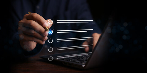 Businessman Take an assessment, Check list, questionnaire, evaluation, filling out an online survey form. Answer the test questions. online survey exam Choosing the right answer in the exam,
