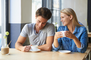 Coffee, cafe or happy couple laughing on date talking or speaking of anniversary on holiday vacation. Tea drink, woman or romantic man in conversation for care, love or support together to relax - Powered by Adobe