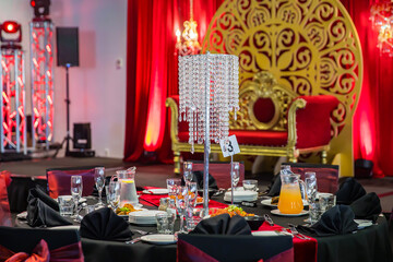 Fototapeta na wymiar Wedding reception restaurant interiors, tables, plates, glasses and cutlery