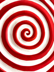 Red and white circles on candy. Background
