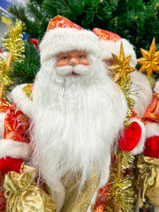 Santa Claus dolls on the counter in the market