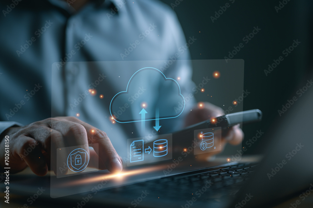 Aufkleber Man use Laptop with cloud computing diagram show on virtual screen. Cloud technology. Data storage. Networking and internet service concept. DMS data management system online, upload and download.