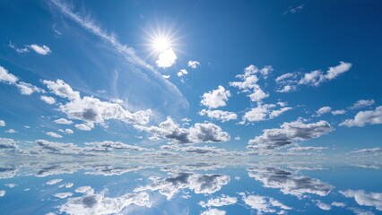 futuristic background consisting of Time lapse clip of white fluffy clouds over blue sky and their reflection, video loop. 4k