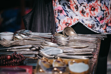 Old silverware at the Dry Brigde flea market in Tbilisi old town, Georgia - obrazy, fototapety, plakaty