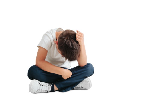 a child whose depression is sitting on the floor