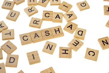 Closeup view row of wooden cubes with CASH letters