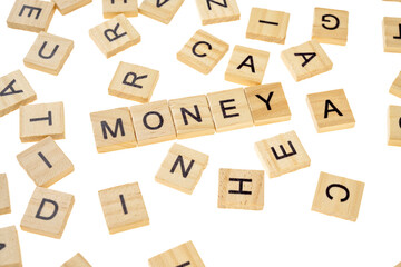 Closeup view row of wooden cubes with MONEY letters